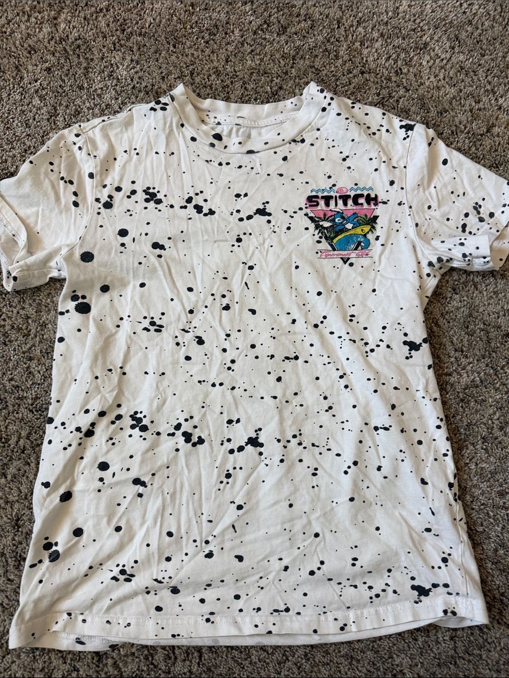 Disney White Tee with Black Splatter and Colorful Stitch Patch